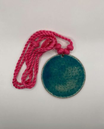 Turqoise enamel pendant made from copper with a hot pink cotton thread necklaces