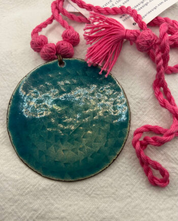 Turquoise enamel and copper pendant